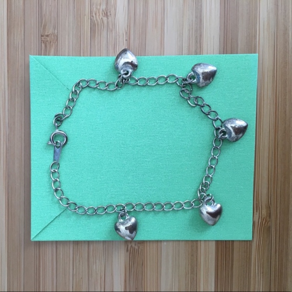 3 for $30. Dangling Hearts Bracelet